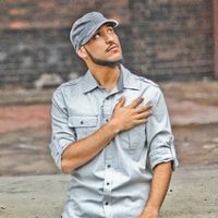 Khaled M, Libyan-American hip-hop artist.